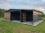 garaz-blaszany-8x6-dwuspadowy-wiata-matowa-czern-dab-rustykalny-9-l.jpg