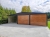 garaz-blaszany-z-wiata-9x6m-matowa-czern-dab-rustykalny-furtka-7.jpg