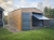 garaz-blaszany-drewnopodobny-4,5x5,5m-z-furtka-dab-grafit-2.jpg